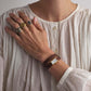 Woman wearing white shirt and Kimsey Watch in Brown Leather “Double Wrap” Strap and gold hardware
