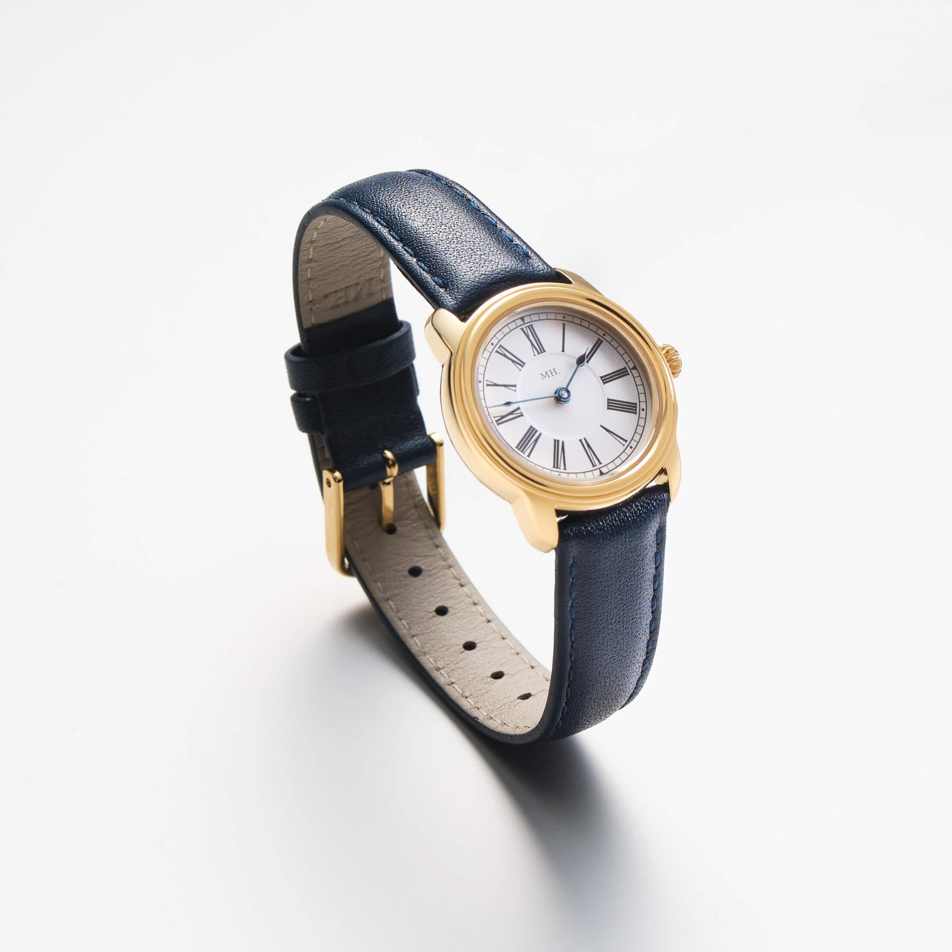Harriet Watch in gold with Navy Leather Strap